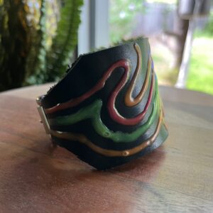 Leather cuff / glow in the dark paint / buckle